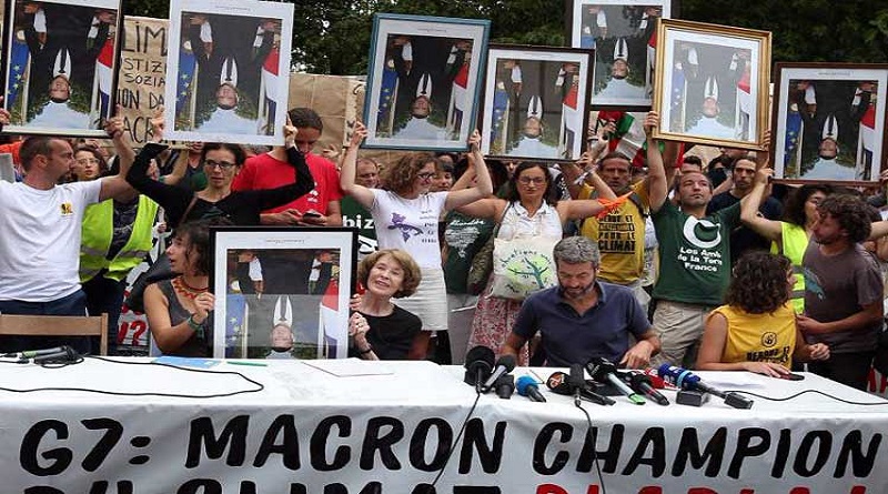 Marcha de retratos acusa a Emmanuel Macron de inacción climática en Francia