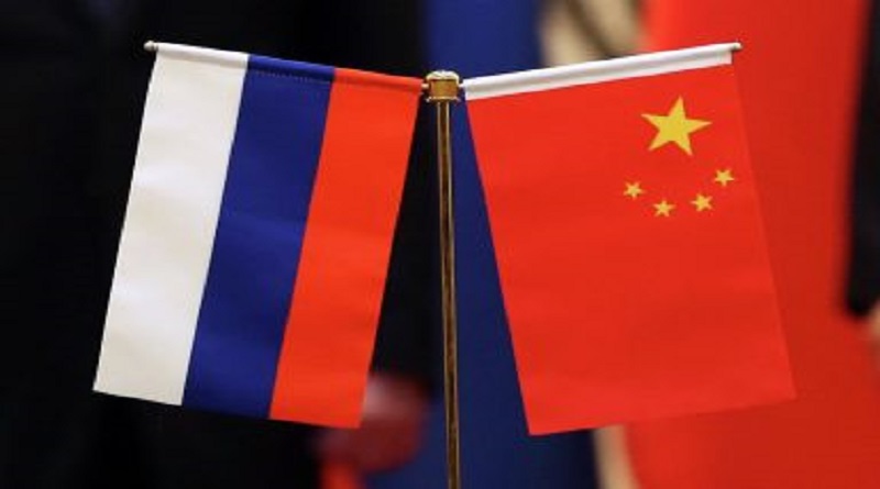 China dispuesta a trabajar con Rusia en rechazo a cualquier intervención externa