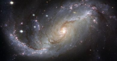 Estrellas recién nacidas hacen brillar una prominente galaxia